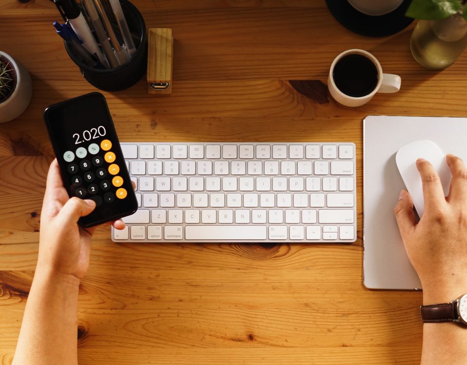Closeup shot of an entrepreneur working from home and doing calculations